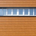 Wooden wall background with small windows. Light wood pattern. Modern wood template. Horizontal